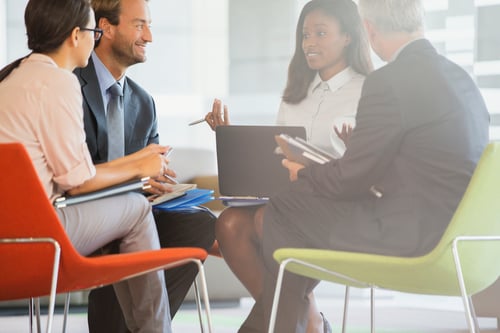 close up of professionals meeting in office