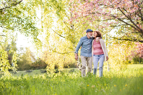 couple walking in the spring