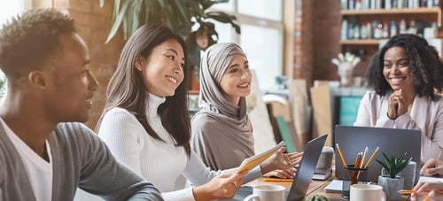 coworkers smiling during meeting