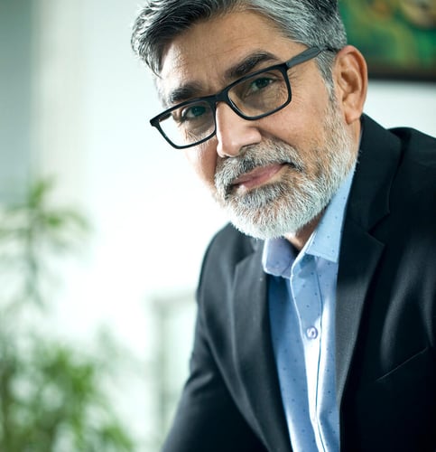 mature businessman looking at the camera