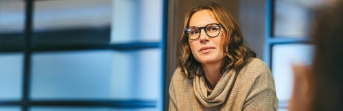 non-profit leader in board meeting