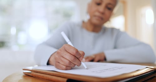 Woman filling out a form